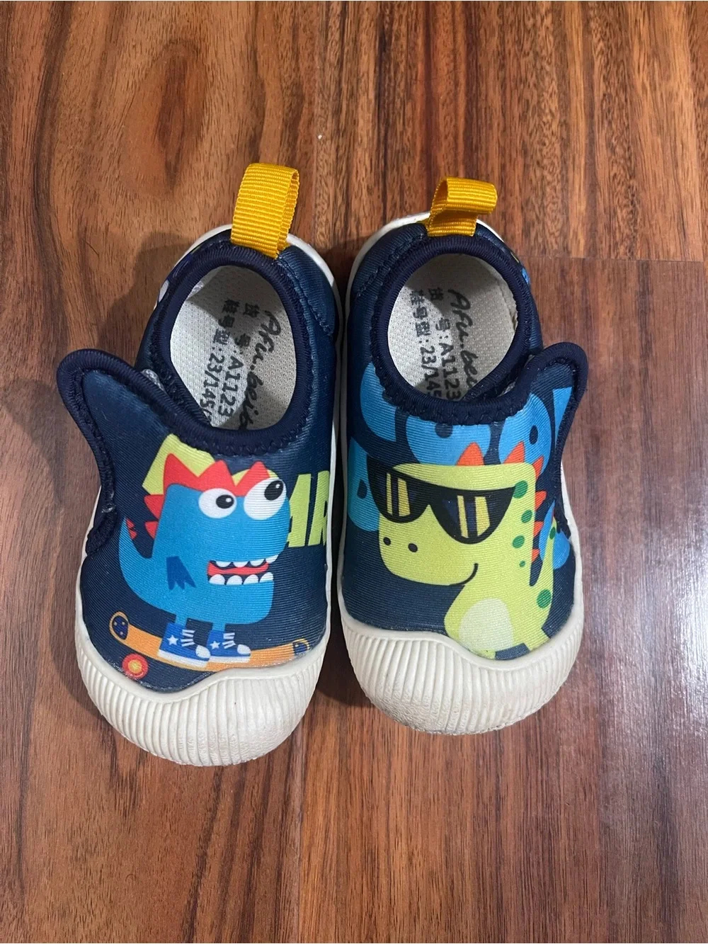 Afu. Beibei 7 or7.5 toddler Kids Navy Dino Slip-On Shoes with Yellow Pull Tab